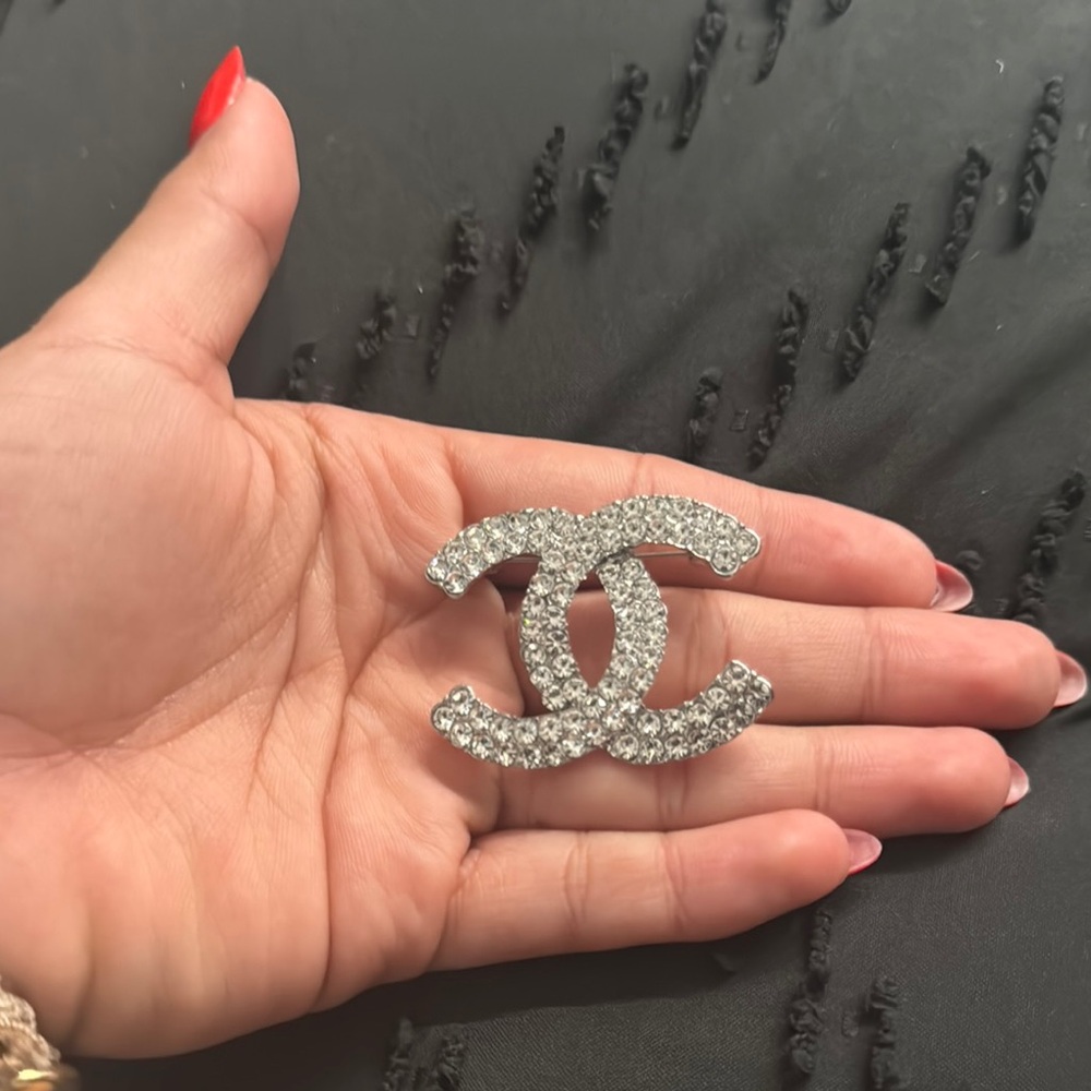CHANEL Silver Crystal Starburst Brooch